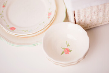 Closeup of porcelain plates and bowls