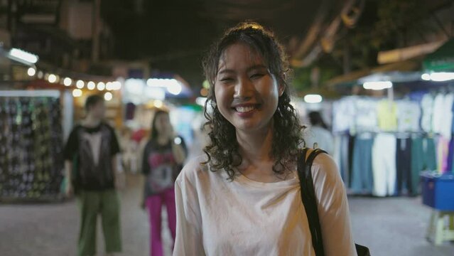 female traveler smiling and posing for the camera in Khaosan Road