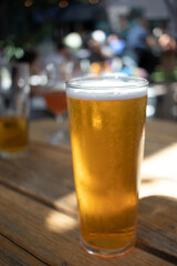 Cold beer on summer patio bar