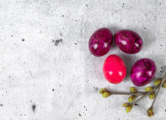 Easter eggs on a light gray background. Easter eggs magenta color