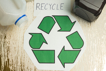 Overhead Angle of Recycle Text with a Recycle Symbol