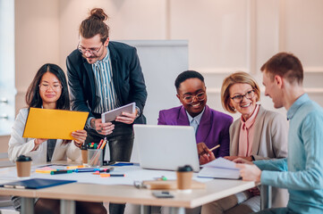 Multiracial business group of people having a meeting in an office