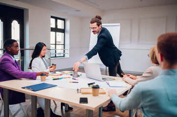 Businessman holding a presentation during a meeting in an office