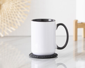 Blank black handle mug mockup photo, black rim mug on the table 