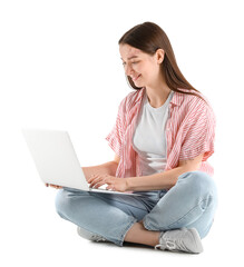 Sitting young woman with laptop isolated on white