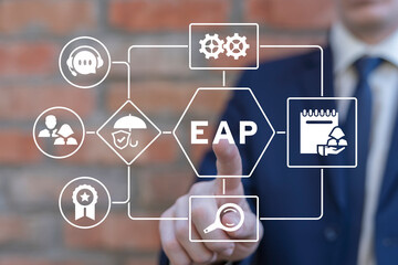Businessman using virtual touch screen presses acronym: EAP. Concept of EAP Employee Assistance...