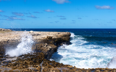waves crashing on the rocks near Devils Bridge on Antigua