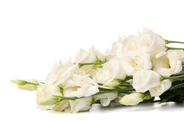 Bouquet of delicate eustoma flowers on white background, closeup