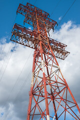 High voltage towers with sky background. Electrical power lines and tower. High voltage post or...