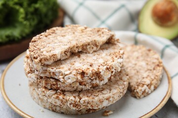 Crunchy buckwheat cakes on plate, closeup view
