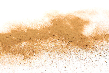 Fototapeta na wymiar Pile of brown dust scattered on white background