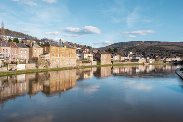 Fototapeta na wymiar The beautiful village of Monthermé lies in the heart of the Ardennes department in France, view from the bridge over the awesome river Meuse.