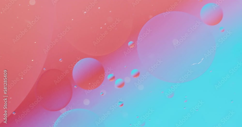 Poster animation of bubbles moving on red and blue background with copy space