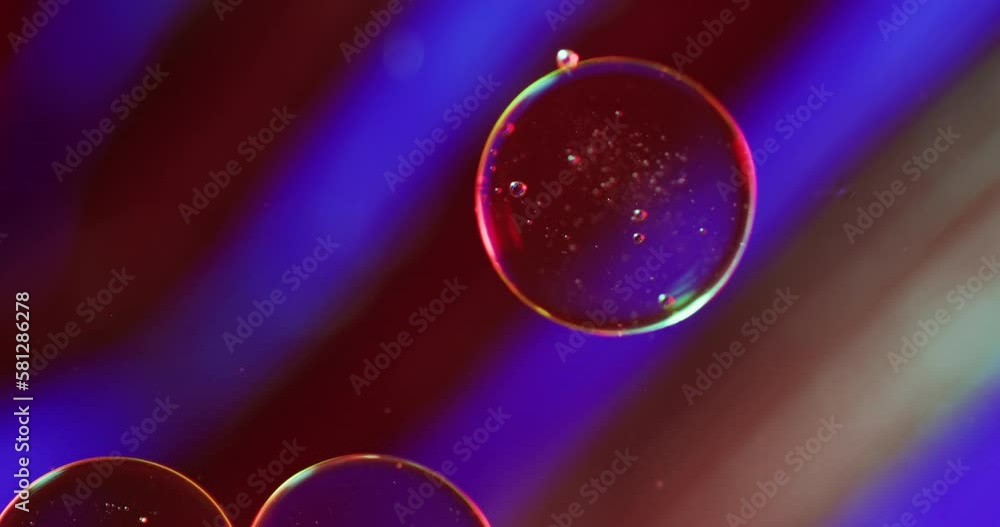 Aufkleber animation of bubbles moving on red and blue background with copy space