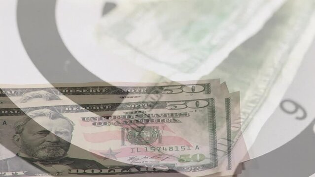 Animation of bull's eye, american dollar banknotes over hand counting banknotes