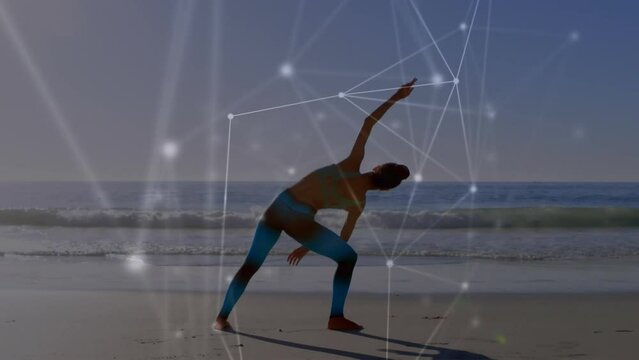Animation of network of connections over caucasian woman exercising at beach