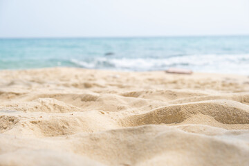 Fototapeta na wymiar Beach sand and background tropical water sea paradise beaches in the Andaman Sea.