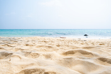 Fototapeta na wymiar Beach sand and background tropical water sea paradise beaches in the Andaman Sea.