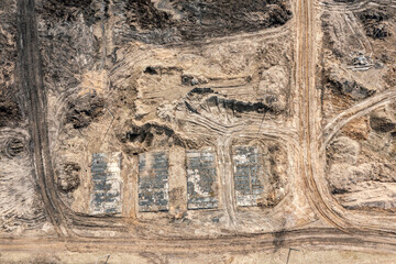 aerial top view of construction site during the earthworks. leveling of construction area.