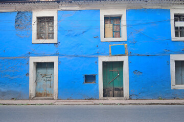 An old, blue coloured Portuguese building in the street in Panaji, Goa.	 - obrazy, fototapety, plakaty