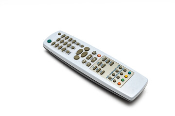 old tv remote with dirty buttons on white background.