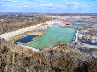 Obraz premium Aerial view landscape. Construction, treatment plant, pond. Infected water. 