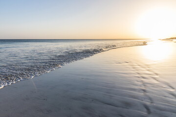 evening white sand beach in Salalah, Sultanate of Oman