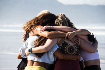 women hug sisterhood love friends beach hugging