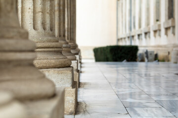 The bases of the columns of the portico.