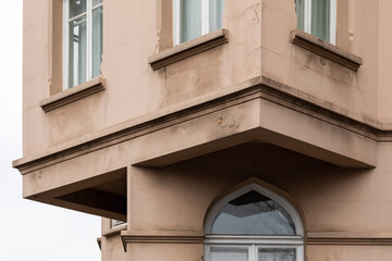 Corner of a traditional building. Two rectangular volumes intersect at an angle.
