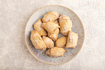 Homemade sweet cookie with apple jam on gray concrete. top view.