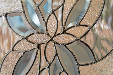 flower pattern on the surface of glossy glass
