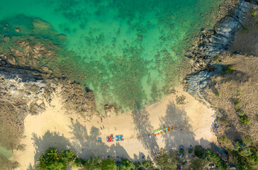 Obraz na płótnie Canvas .aerial panorama view above turquoise sea around Nui beach small beach surrounded by tourist attractions..Nui beach is the good place for swimming snorkeling and sea canoe..turquoise sea background..