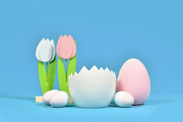 Newborn digital backdrop with white eggshell with Easter eggs and felt tulip flowers in background