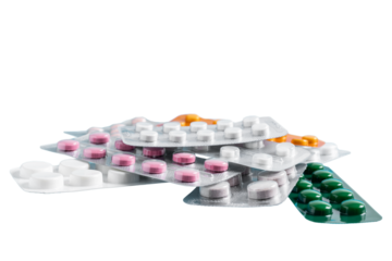 Pile of various pills and tablets in a blister packs, isolated on transparent background, healthcare and medicine concept
