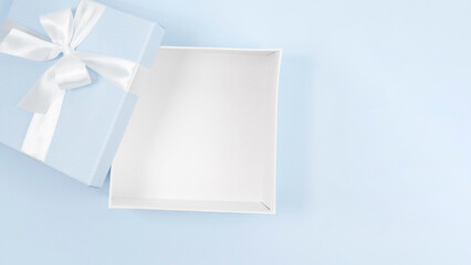 A box with a bow on a blue background.