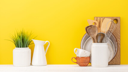 Kitchen utensils on wooden table