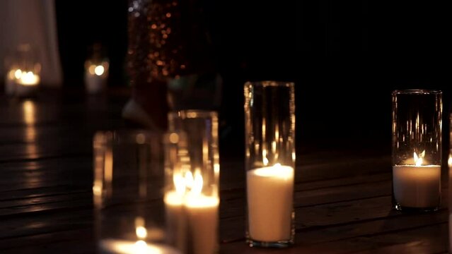 Couple in love dancing during a romantic candlelight dinner