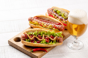 Various hot dog and beer
