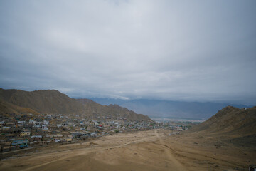 Beautiful view mountain and street view of Khardung La Pass- Leh road on the high mountain covered with snow. It is the highest pass in the world that motorbikes can run through at Ladakh, Leh, India