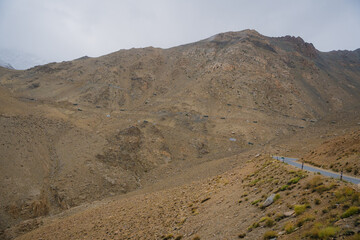 rolling hills and clouds on the top of the mountain at Ladakh, Leh, India