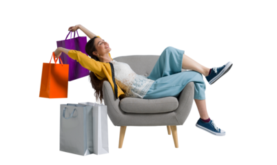 Cheerful shopaholic woman with shopping bags