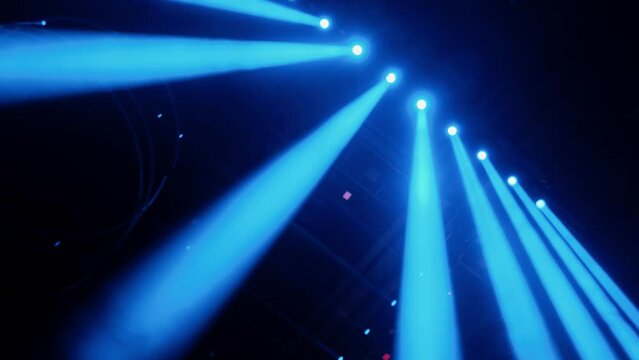 Online event entertainment concept. Background for online concert. Blue stage spotlights. Empty stage with blue spotlights. Blue stage lights. 