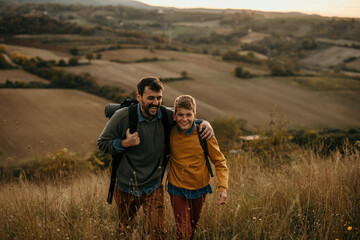 Happy family: father and children son on a nature hike at sunset. People and landscape concept