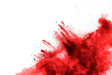 Red powder explosion on white background. Red powder explosion.Freeze motion of red dust particles...
