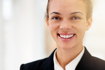 Her career knows no bounds. Closeup portrait of a smiling young businesswoman.