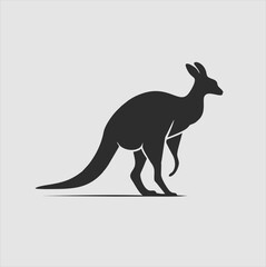 black kangaroo silhouette isolated on white. Kangaroo cartoon simple vector icon illustration. kangaroo animal design element.