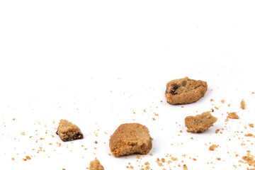Chocolate chip cookies and crumbs isolated on white background.Top view