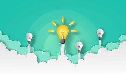 Light bulb and team launch in to the sky over the cloud with business icons on green background in vector paper art concept.