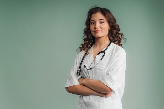 Portrait Of Young Curly Nurse, Studio Shoot.